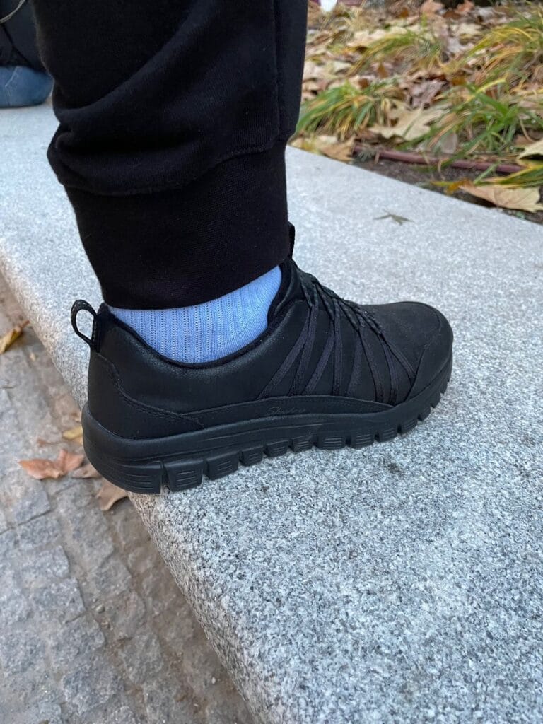 skechers graceful‑cozy hug vegan shoes on wall