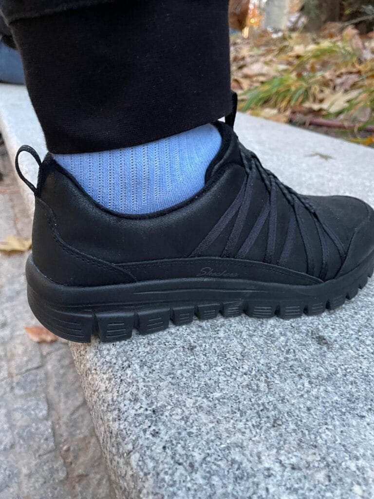 skechers graceful cozy hug vegan shoes on wall near