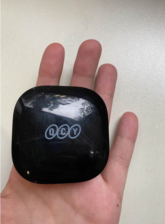 QCY T13 Black Case in Hand